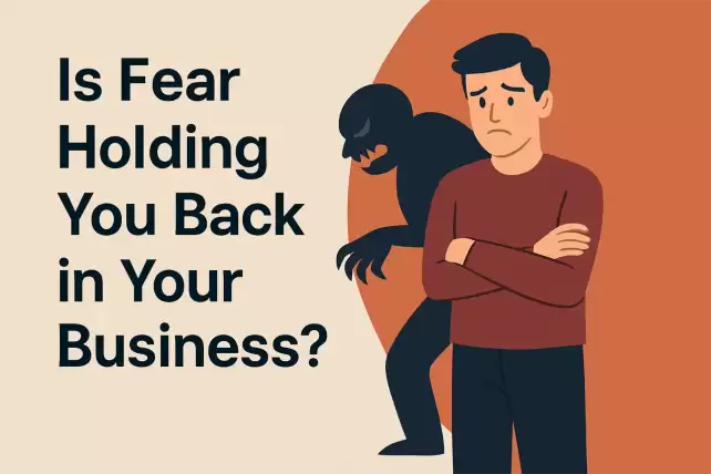 Concerned entrepreneur standing with arms crossed while a dark shadow representing fear looms behind him, illustrating fear holding you back in your business.