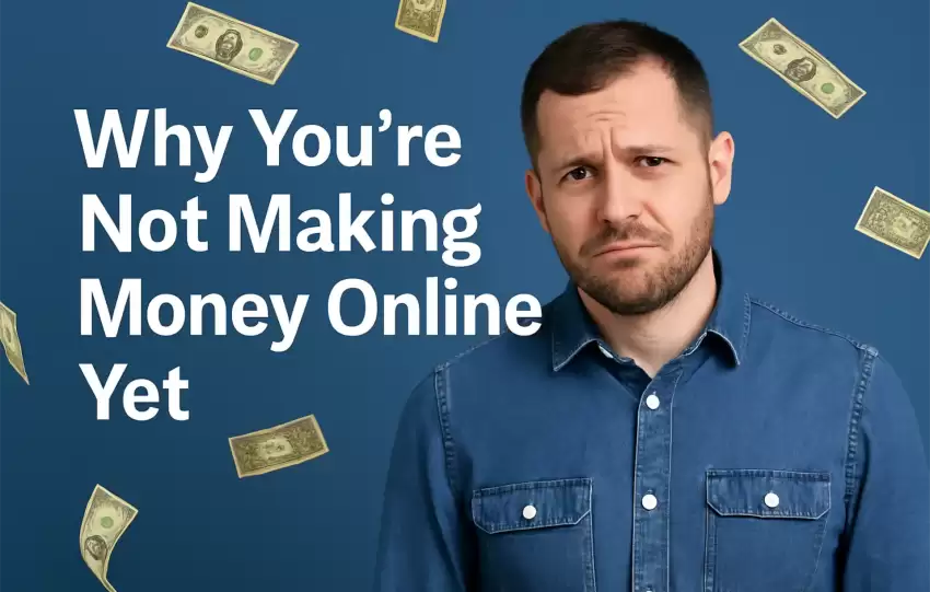 Frustrated Caucasian man sitting at a desk with floating dollar bills around him, symbolizing the struggle to make money online.