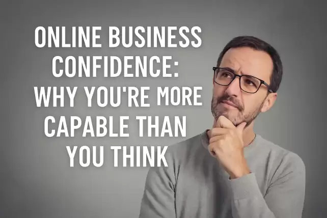 A confident middle-aged man smiling while seated at a home office desk with a laptop, symbolizing online business confidence and readiness to succeed.